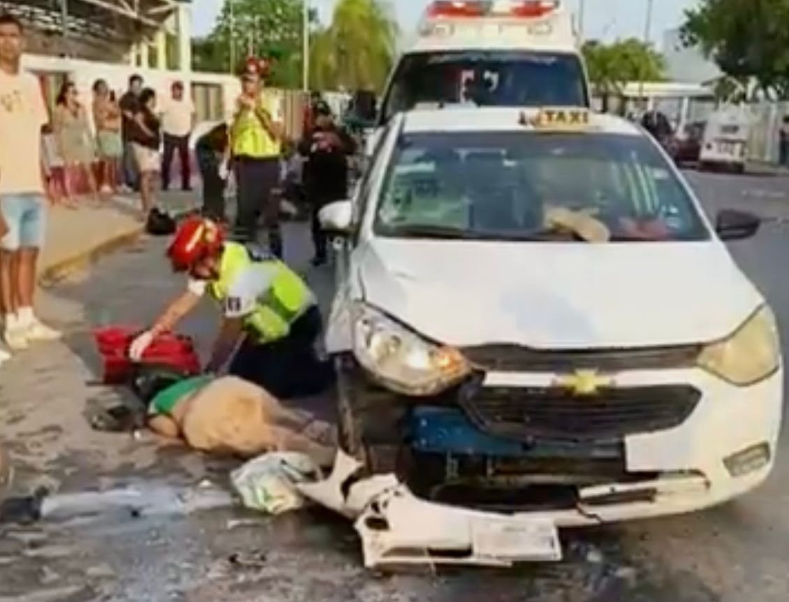 Emergency responders at the scene of a motorcycle crash in Playa del Carmen