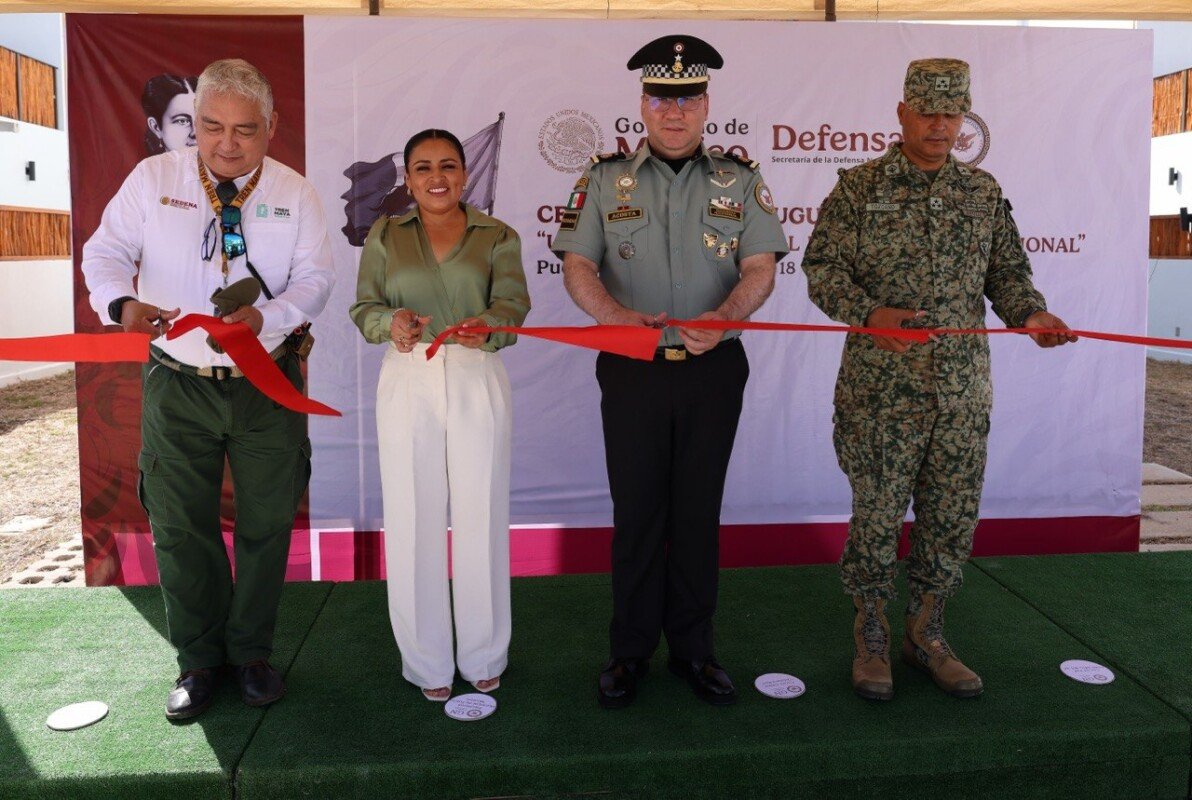 Officials cut the ribbon at the inauguration of the National Guard housing complex in Puerto Morelos