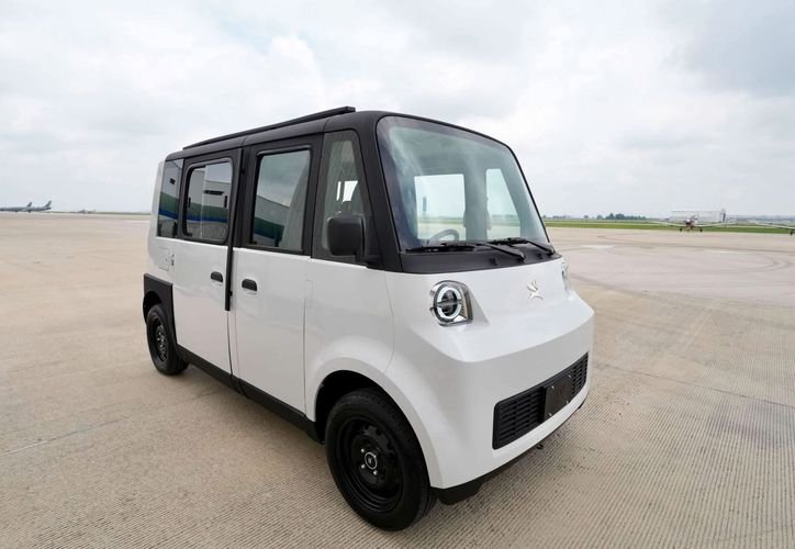 Olinia electric vehicle prototype displayed at an event