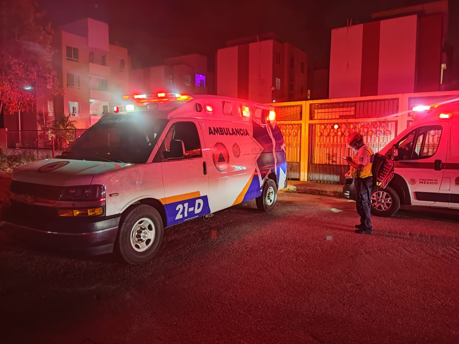 Firefighters at the scene of an apartment fire in Playa del Carmen's Mision de las Flores neighborhood