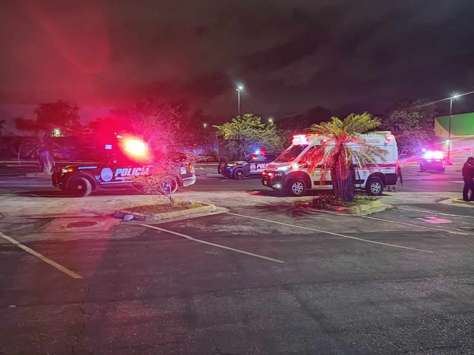 Crime scene tape around a supermarket parking lot in Playa del Carmen where a gang leader was killed