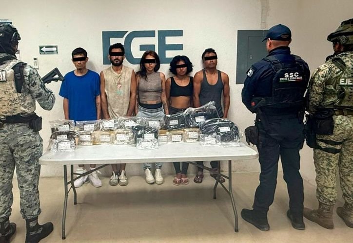 Police officers at a drug bust in Playa del Carmen