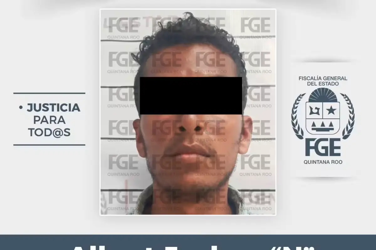 A man in handcuffs being led into a courthouse in Playa del Carmen