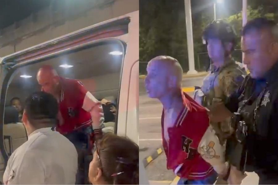 Police officers detain a man on a highway in Puerto Morelos after a woman tracked her stolen cellphone via GPS