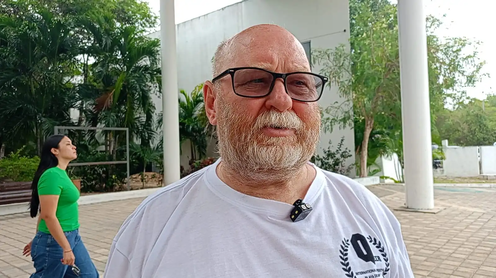 Jan Novak, organizer of the Queer International Film Festival, speaking at a press event in Playa del Carmen