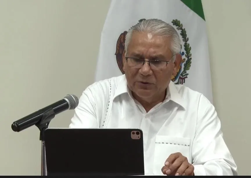 Quintana Roo State Prosecutor Raciel Lopez Salazar speaking at a press conference