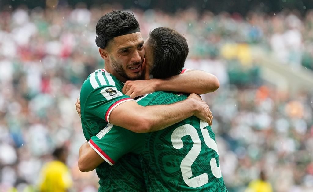 Raul Jimenez embraces teammate Roberto Alvarado after scoring the second goal for Mexico during the Group A match against South Africa at the 2026 World Cup in Mexico City.