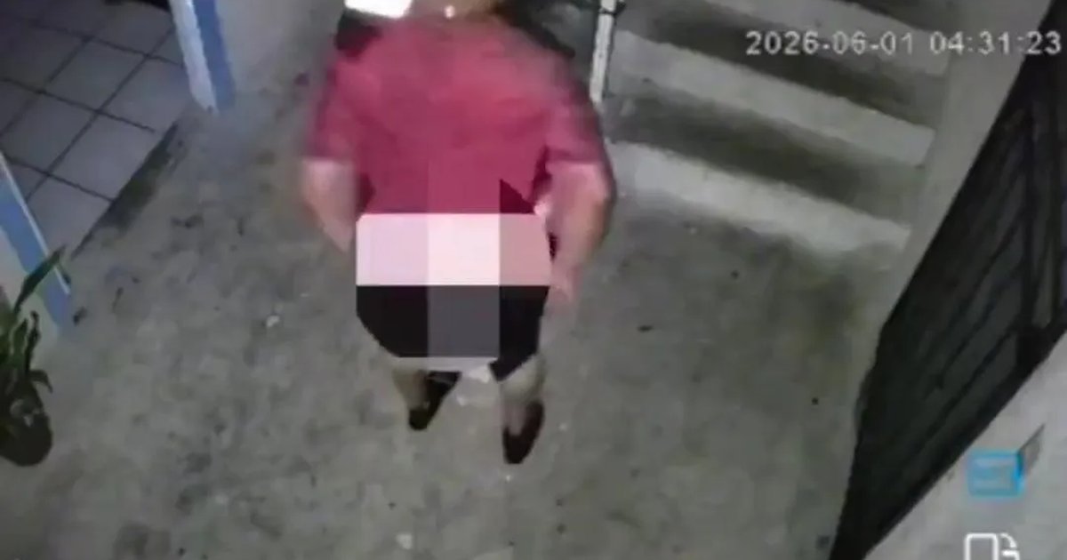 Still from security video showing a man in underwear outside a home in Cancun's Region 260