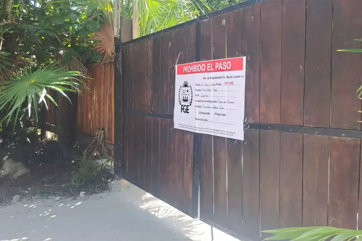 Official seals placed on the entrance of a hotel inside Tulum's Jaguar Park after seizure by state prosecutors