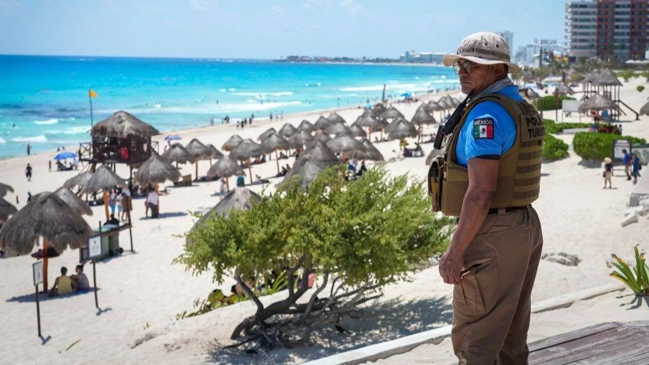 Newly graduated tourist police officers in uniform standing in formation in Quintana Roo