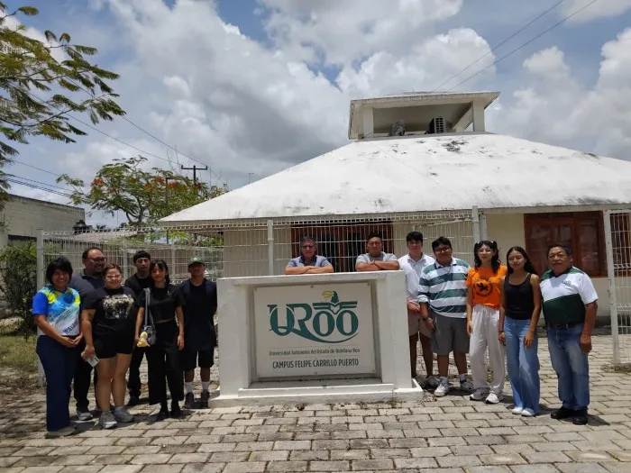 Students from the University of Quintana Roo participate in a Maya language field practice in the community of Uh May.