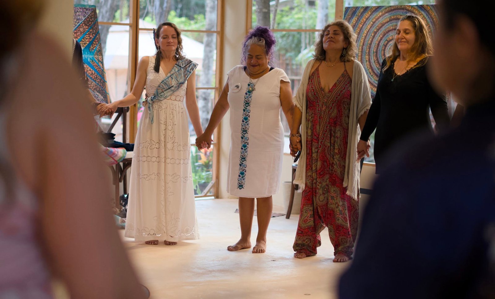 People participating in a wellness activity at Venamarte Con Todo festival in Puerto Morelos jungle