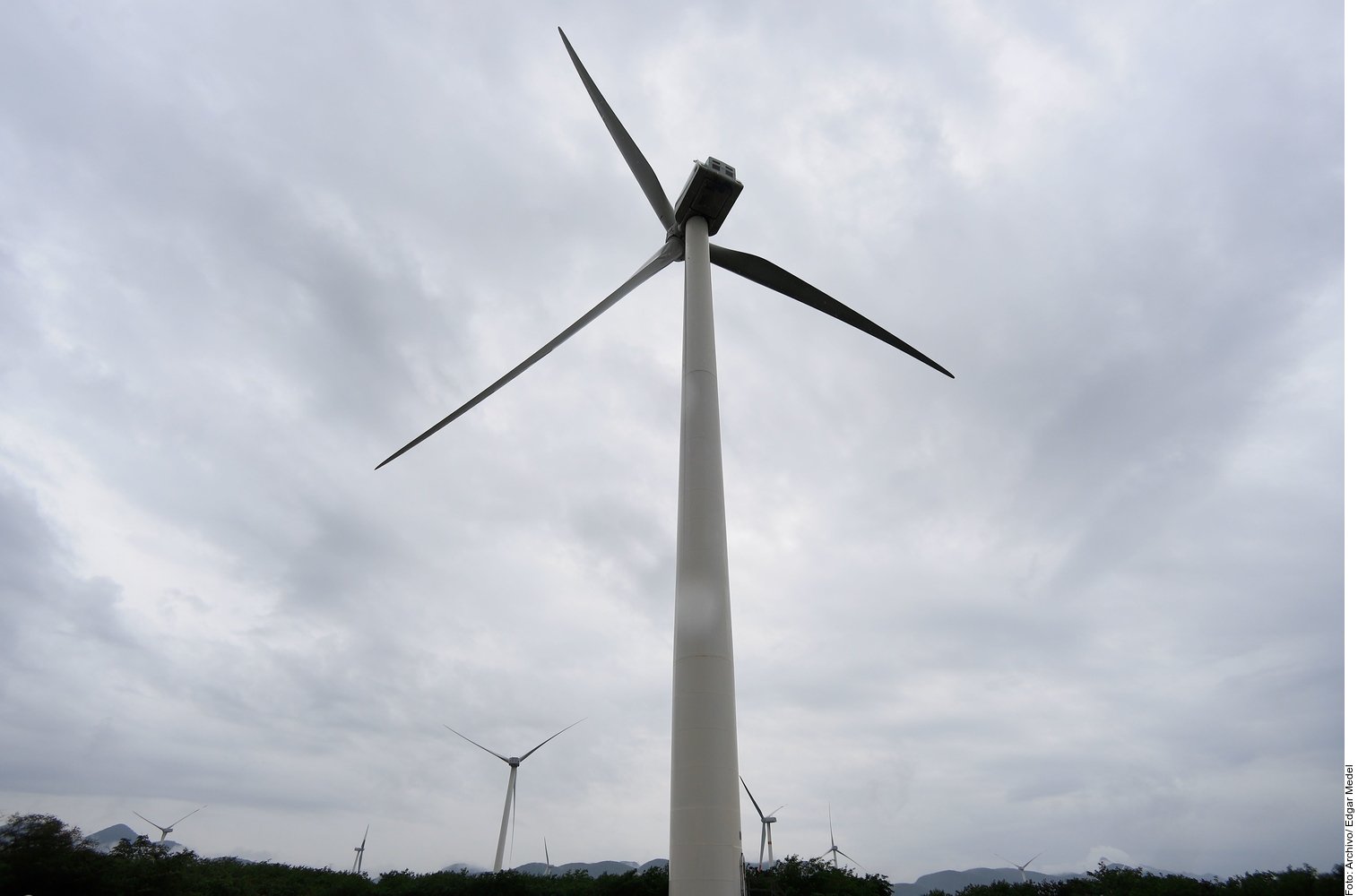 Wind turbines generating electricity in a rural area of Mexico