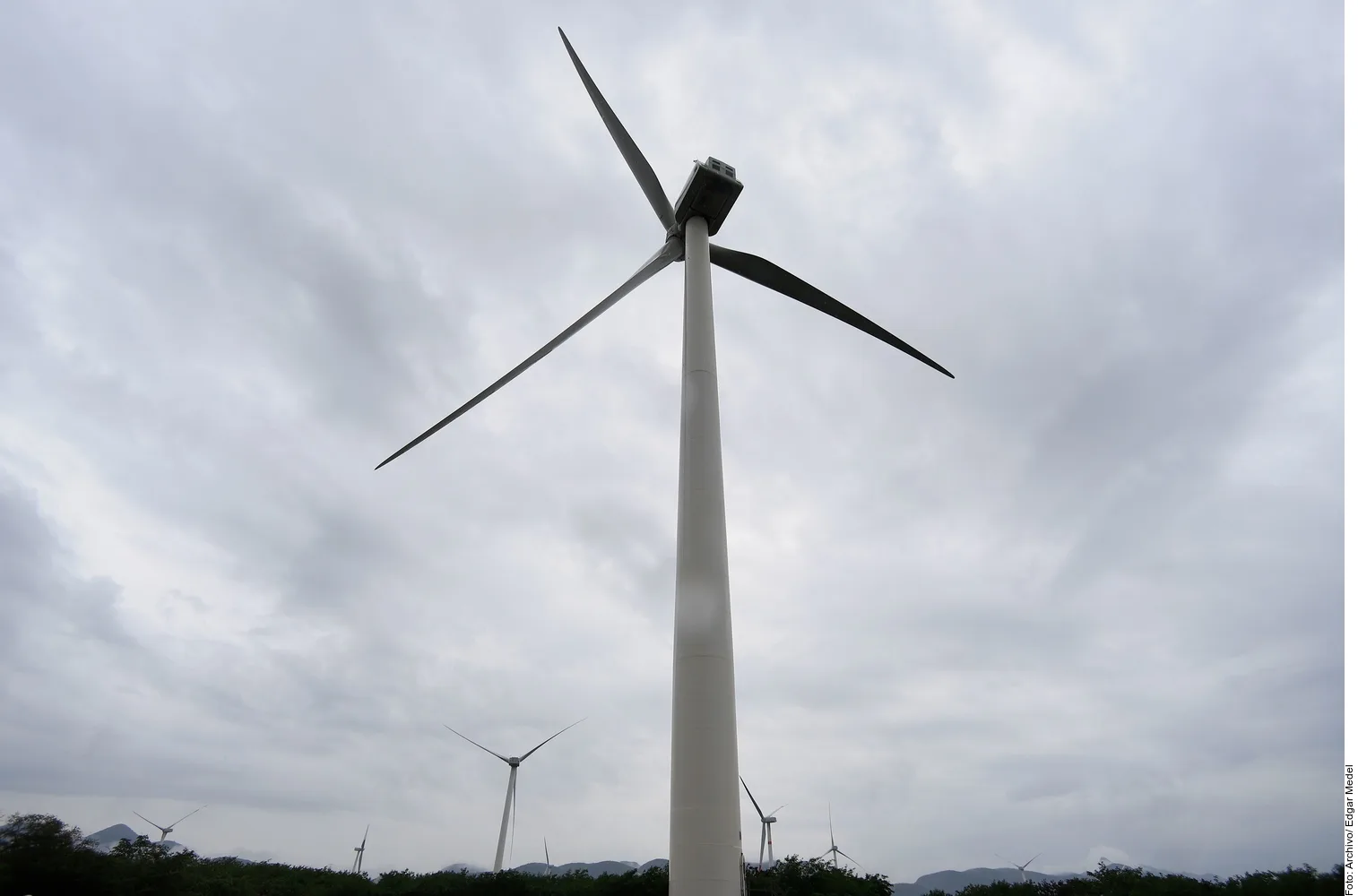 Wind turbines generating electricity in a rural area of Mexico