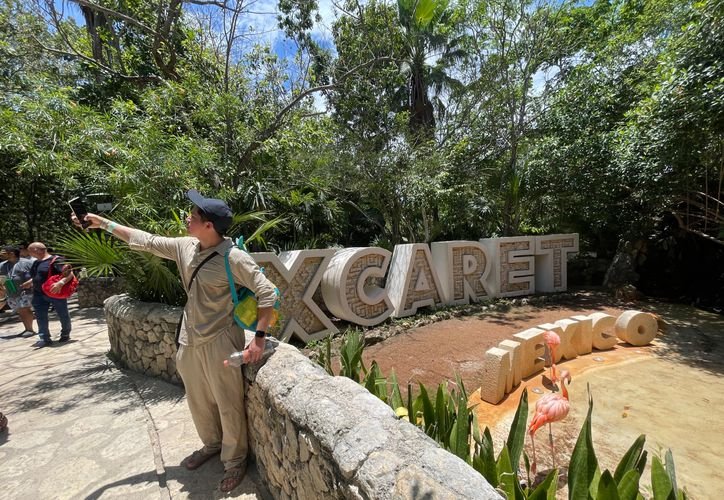Entrance to Xcaret park featuring Maya-inspired architecture and symbols