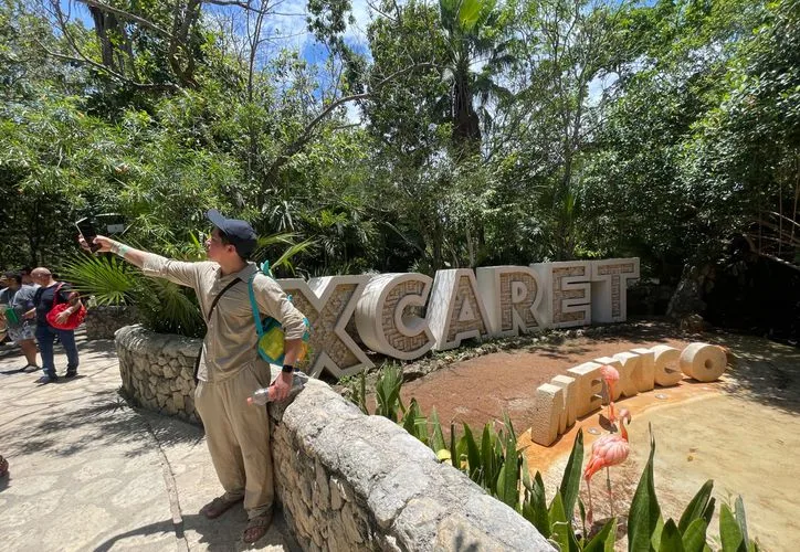 Entrance to Xcaret park featuring Maya-inspired architecture and symbols