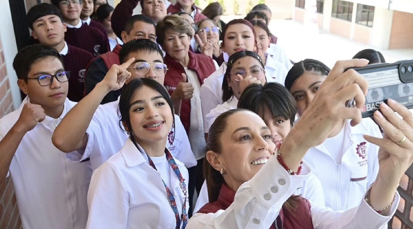 President Claudia Sheinbaum takes a selfie with high school students