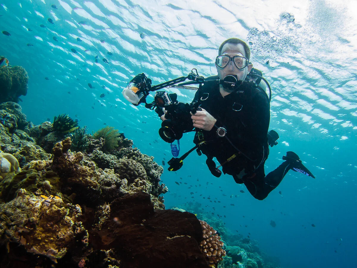 Scuba Diver with Underwater Camera Gear