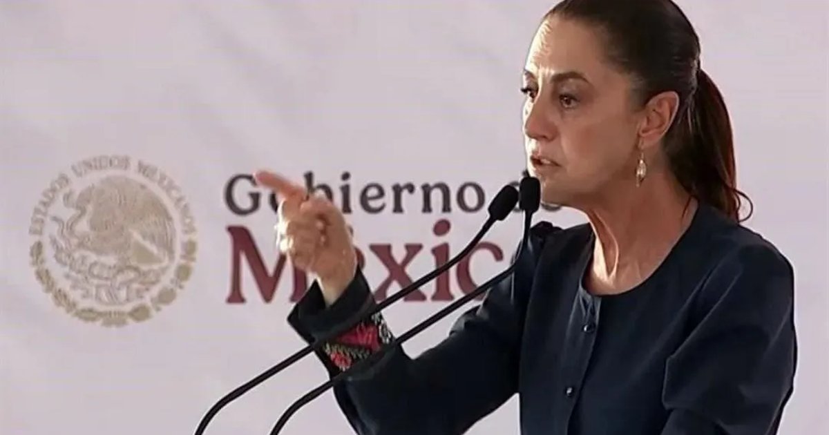 Women's rights activists hold signs demanding action against gender violence in Mexico