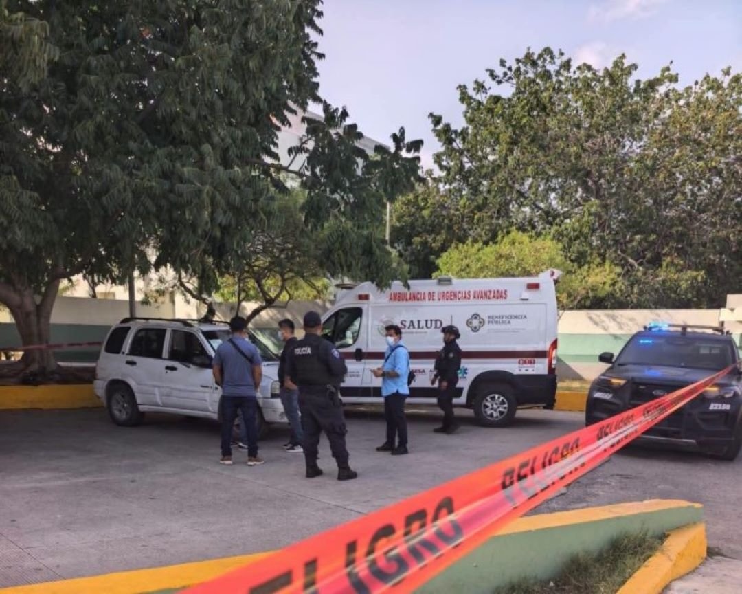 An ambulance parked outside the IMSS-Bienestar hospital in Playa del Carmen, where a woman was pronounced dead upon arrival.