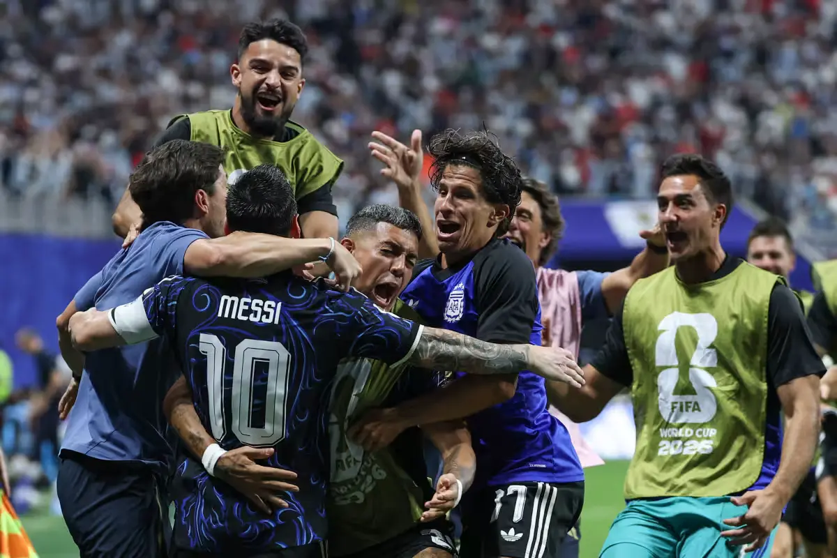 Argentina soccer players celebrate their 2-1 comeback victory over England in the 2026 World Cup semifinal