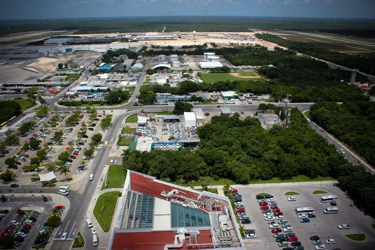 Cancun International Airport terminal with security personnel