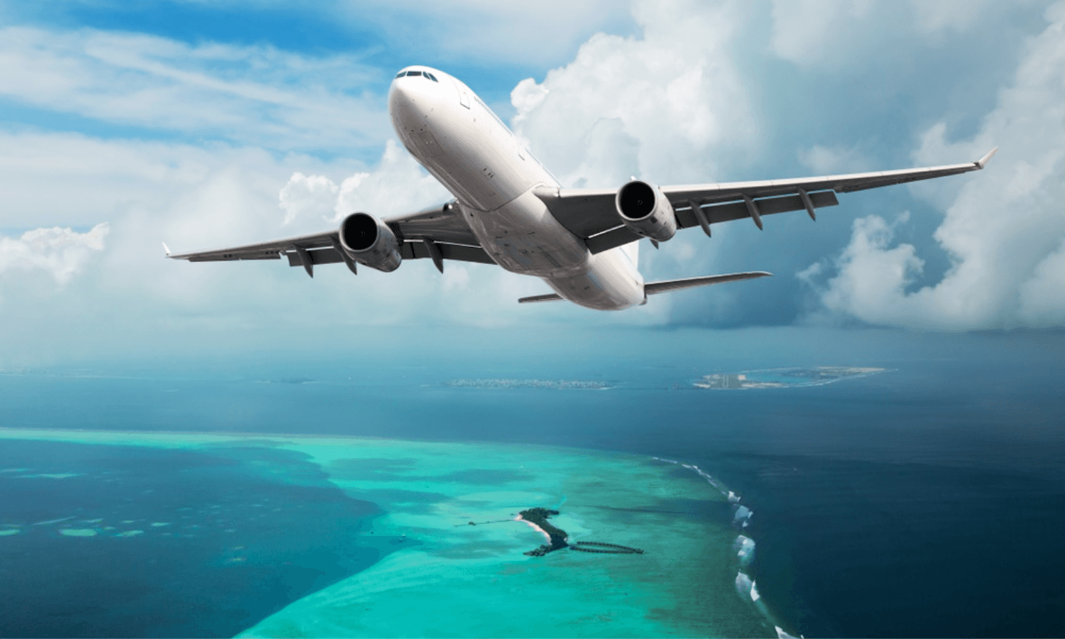 Aerial view of Cancun International Airport with several aircraft parked at gates