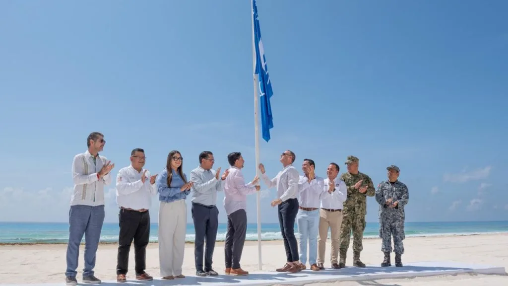 Blue Flag ceremony in Cancun with officials and flags
