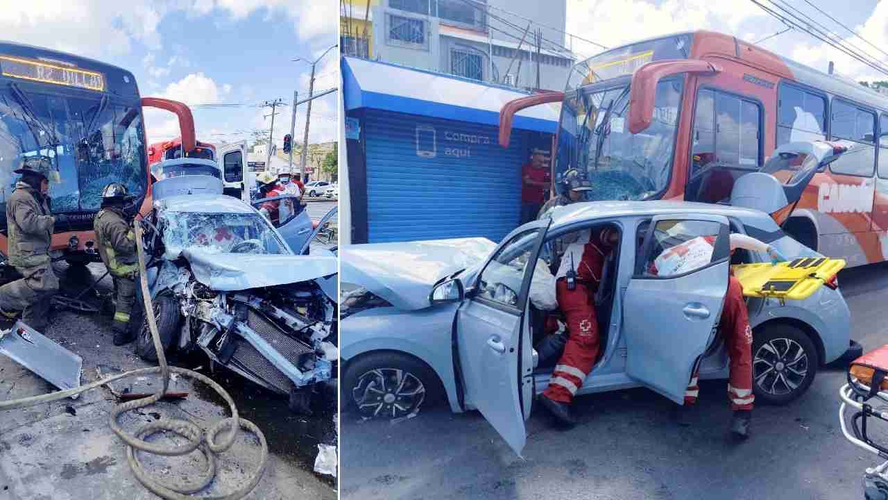 Firefighters using hydraulic equipment to rescue a trapped man from a vehicle at the intersection of Kabah and Francisco I. Madero avenues in Cancun.