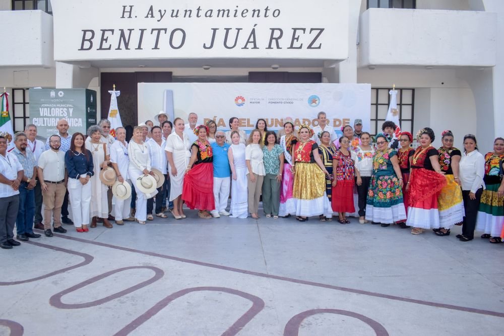 Officials and citizens gather at Cancún's Plaza de la Reforma for a flag-raising ceremony celebrating Founder's Day