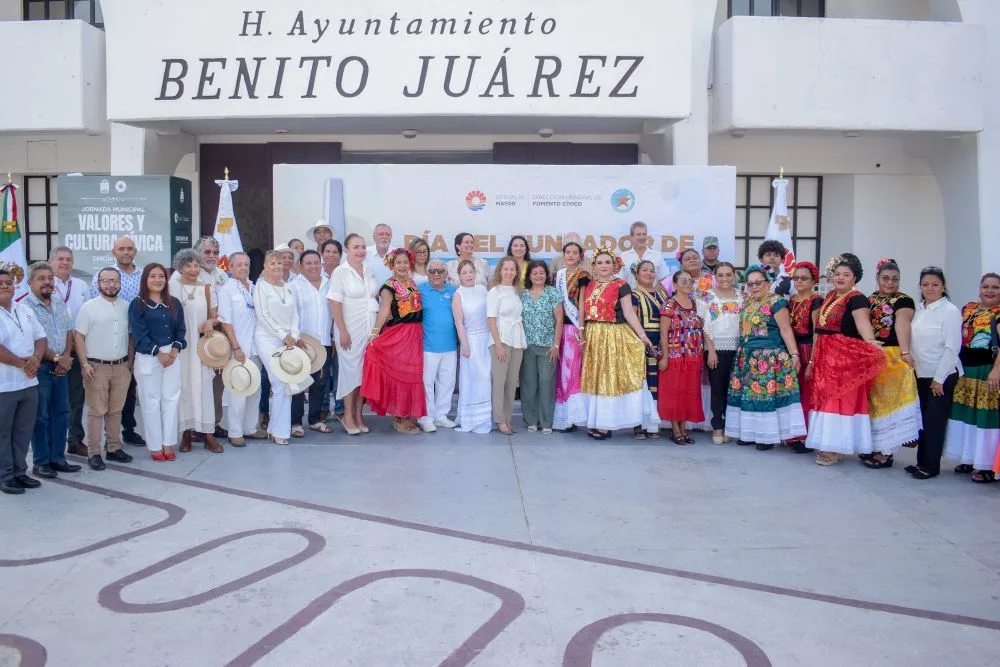 Officials and citizens gather at Cancún's Plaza de la Reforma for a flag-raising ceremony celebrating Founder's Day