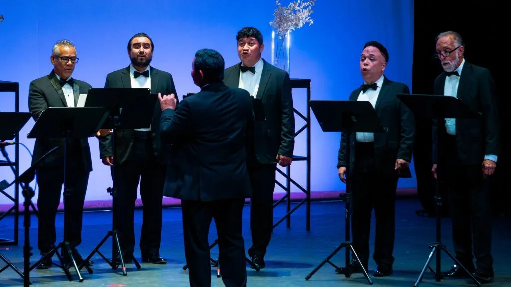 Cancun Municipal Choir performing on stage at Teatro de la Ciudad