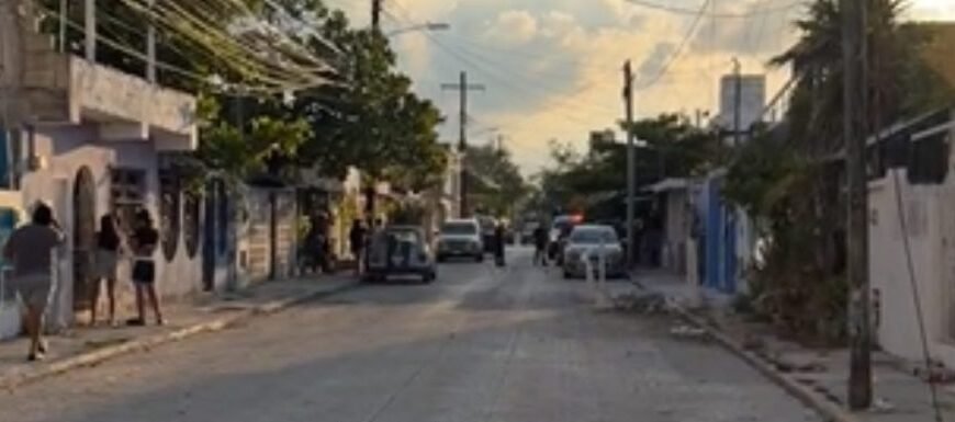 Crime scene tape at a house in Cancun's Donceles neighborhood after a fatal shooting