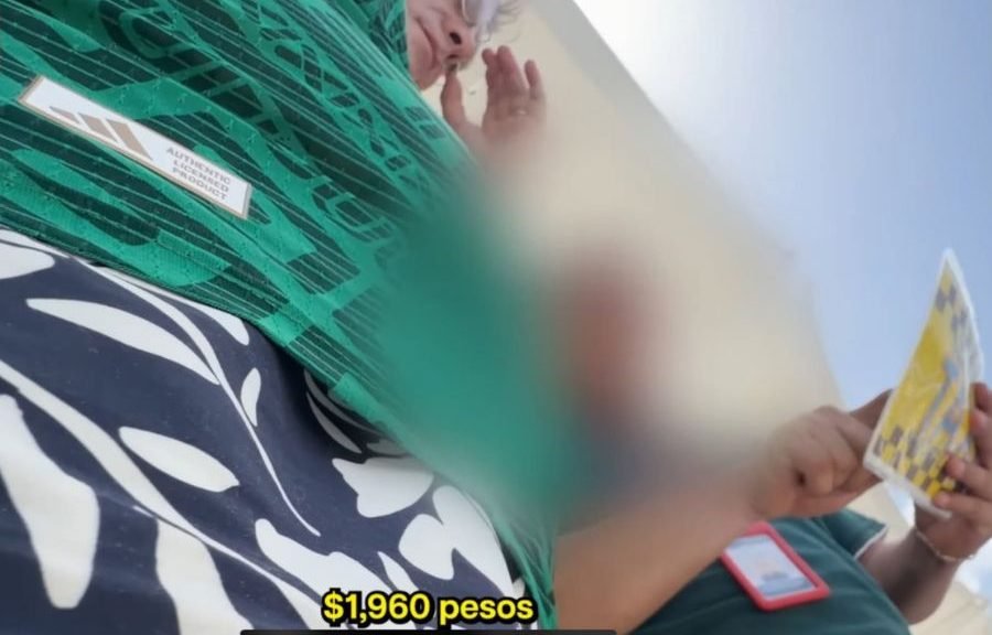 Screenshot from a YouTube video showing a taxi driver in Cancun