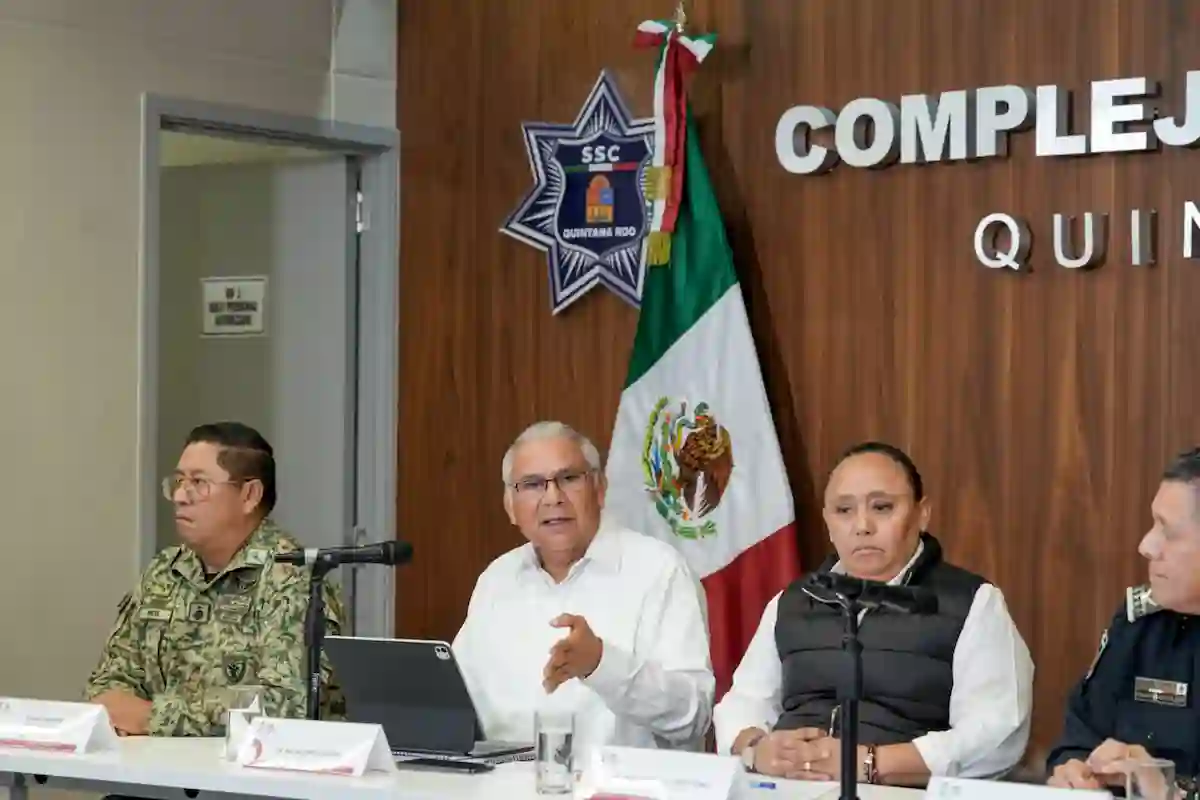State prosecutor Raciel Lopez Salazar announcing the arrest of three tourist police officers in Cancun