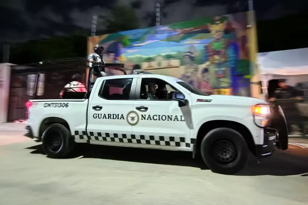 Police vehicles and officers responding to a false emergency call in Cancun