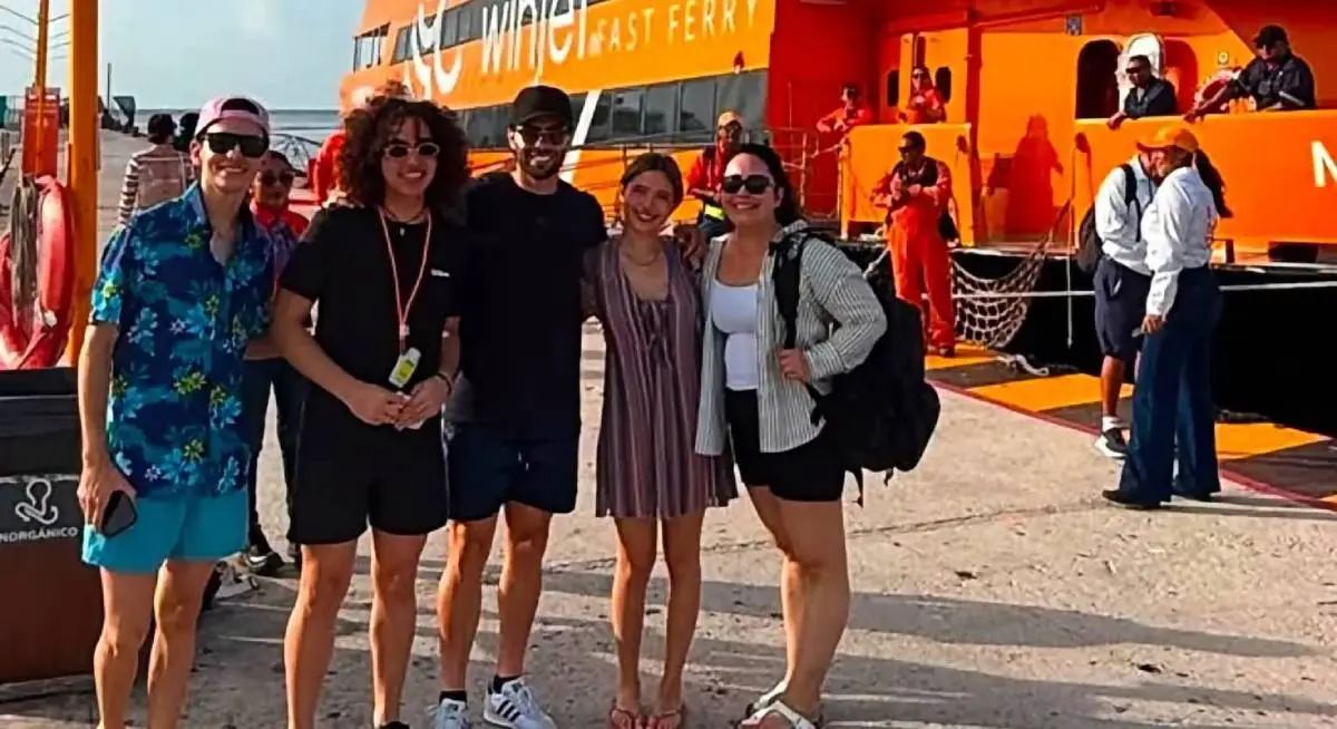 Cesar 'Chino' Huerta walking in Cozumel wearing casual clothes and sunglasses