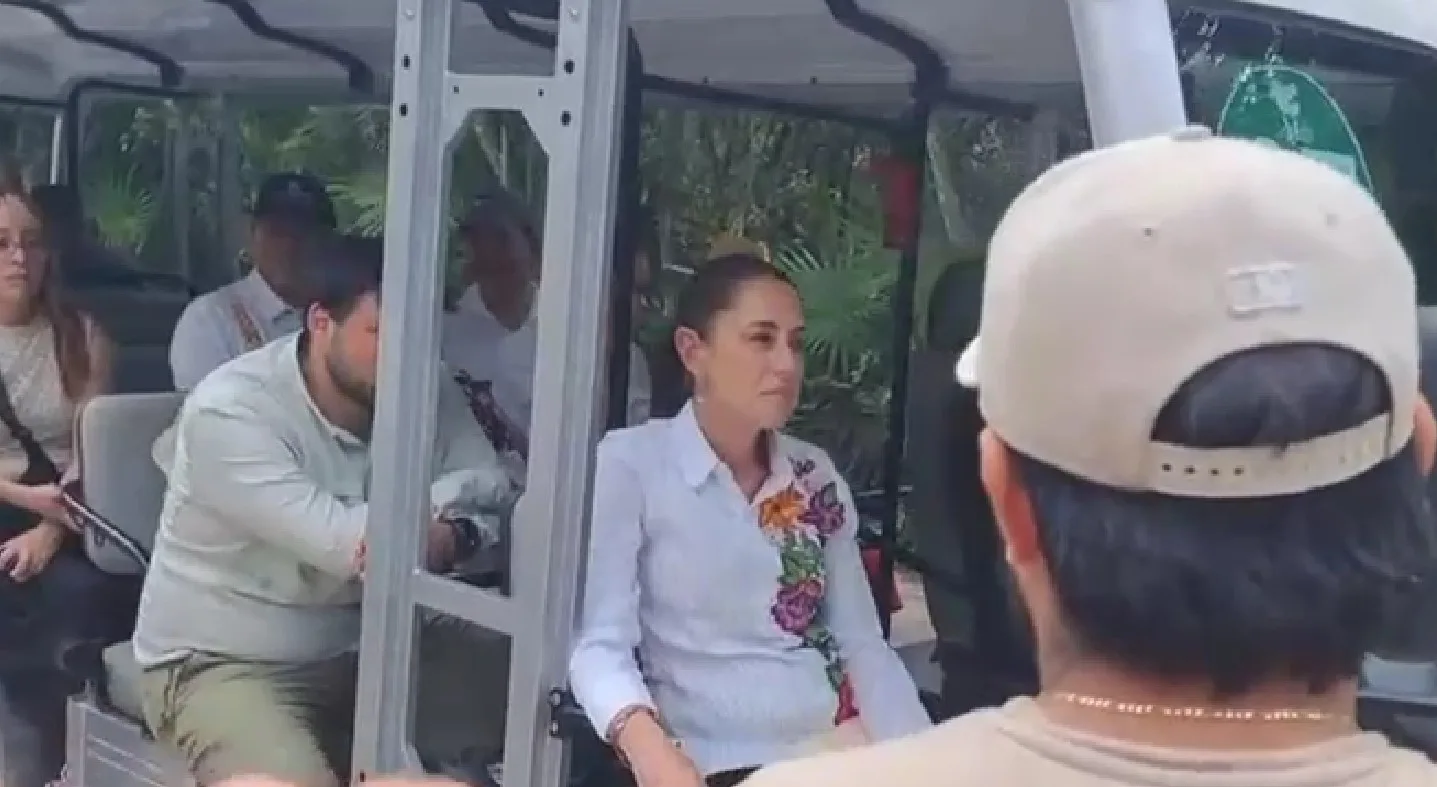 President Claudia Sheinbaum speaking with officials at Parque del Jaguar in Tulum