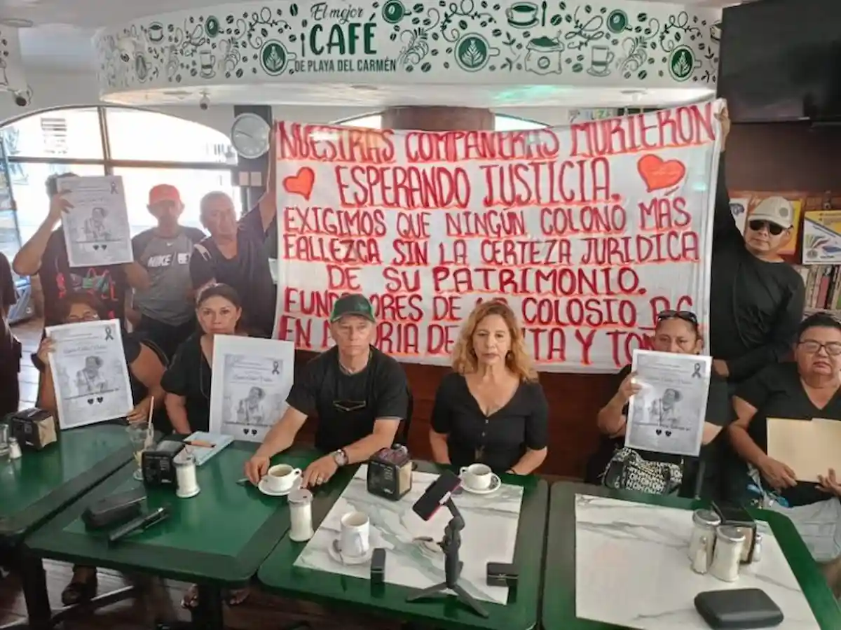 Residents of Colonia Colosio in Playa del Carmen hold a press conference to dispute official property title numbers.