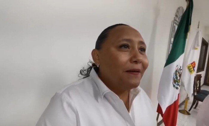 Cristina Torres, Secretary of Government of Quintana Roo, speaking at a press conference