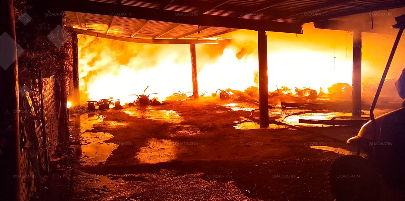 Burnt golf carts after a fire in Mahahual, Quintana Roo