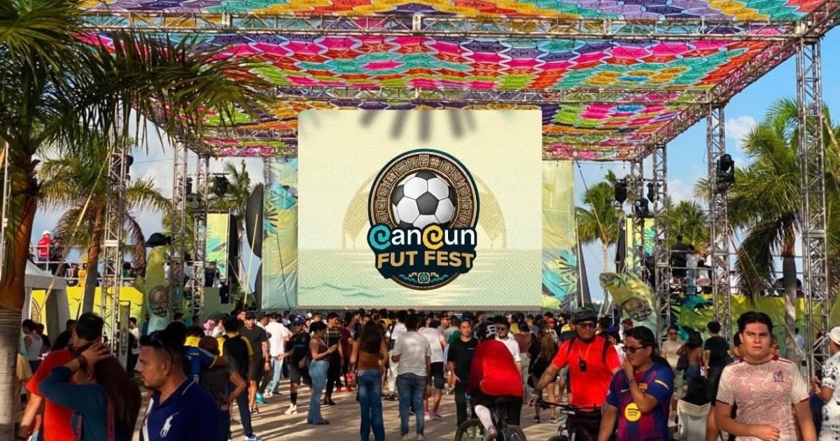 People watching a World Cup match on a giant screen at a FutFest event in Quintana Roo
