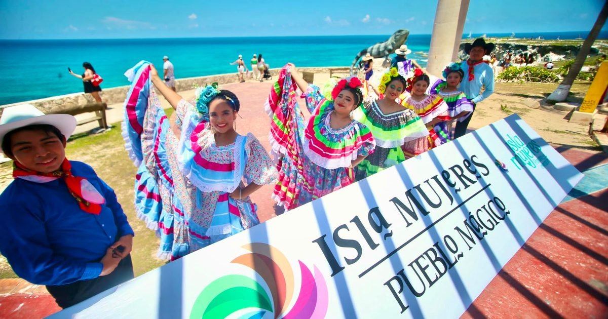 Aerial view of Playa Norte beach in Isla Mujeres with clear turquoise water and white sand