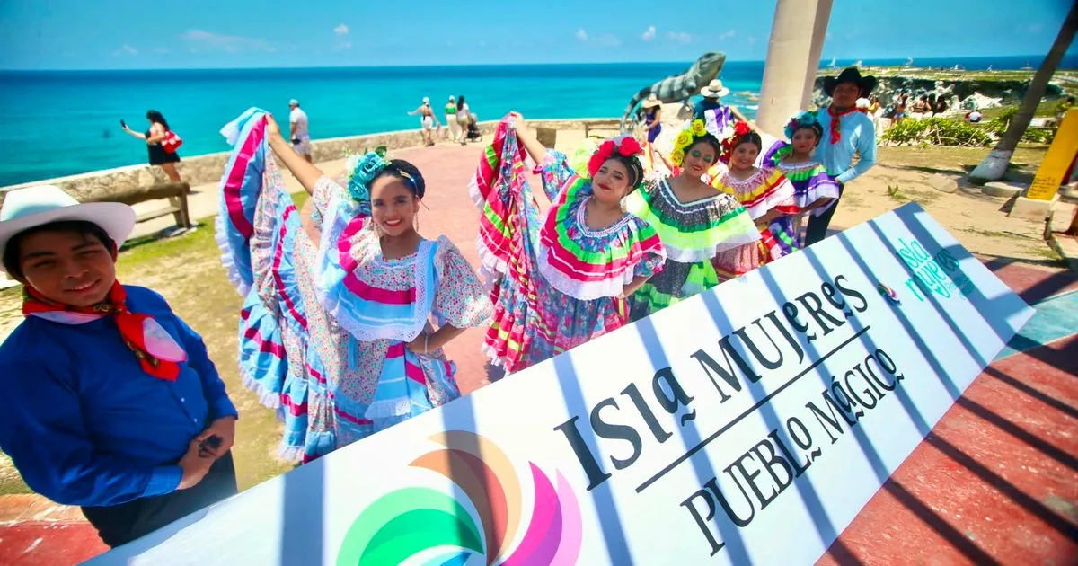 Aerial view of Playa Norte beach in Isla Mujeres with clear turquoise water and white sand