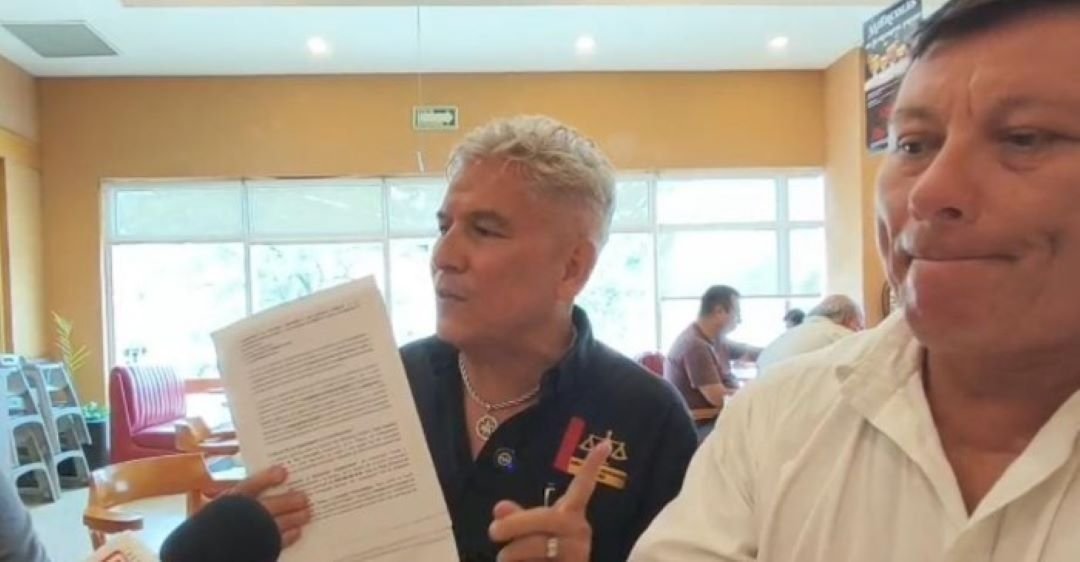 Lawyer José Luis González Navarro speaks during a press conference in Isla Mujeres