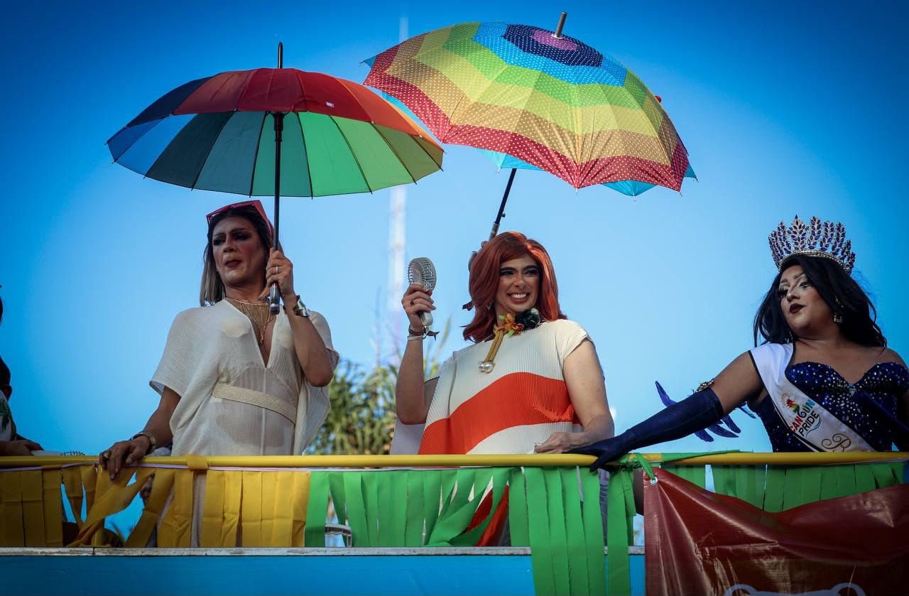 Rainbow flag representing LGBTQ+ community at a public event in Quintana Roo, Mexico