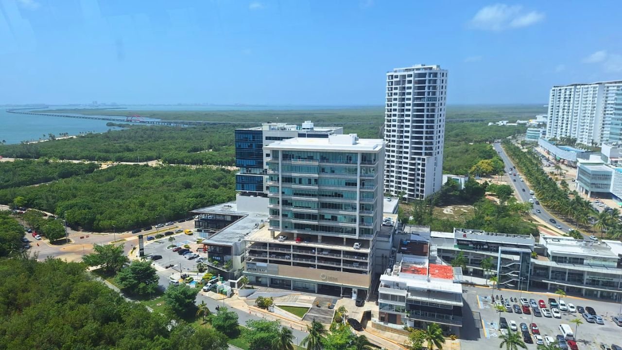 Aerial view of the Malecón Tajamar area in Cancun showing the lagoon and urban development