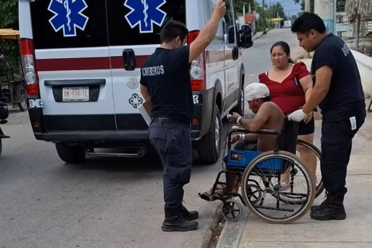 Paramedics attending to a man attacked by a crocodile in a lagoon in José María Morelos, Quintana Roo