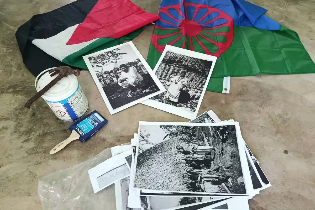 Historical photographs of Maya community life from 1936 displayed at Casa de la Memoria in Dzula