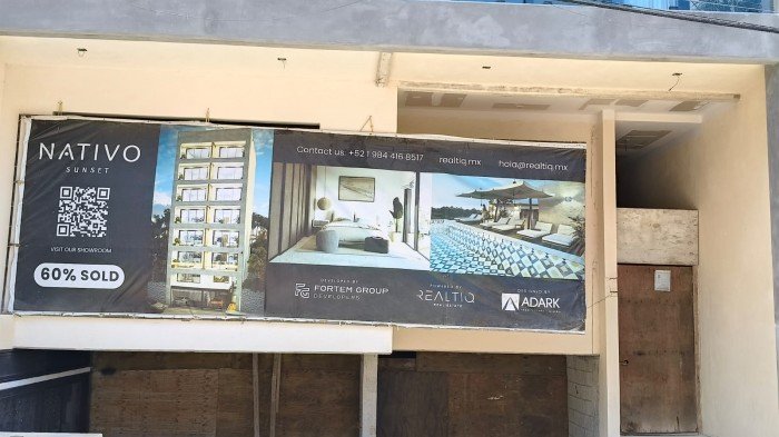 Exterior view of the Nativo Sunset condominium building in Playa del Carmen, Quintana Roo